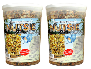 two pack of nutsie seed logs with fruit and nuts