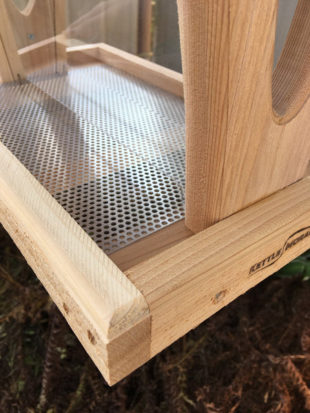 perforated screen in hopper feeder tray